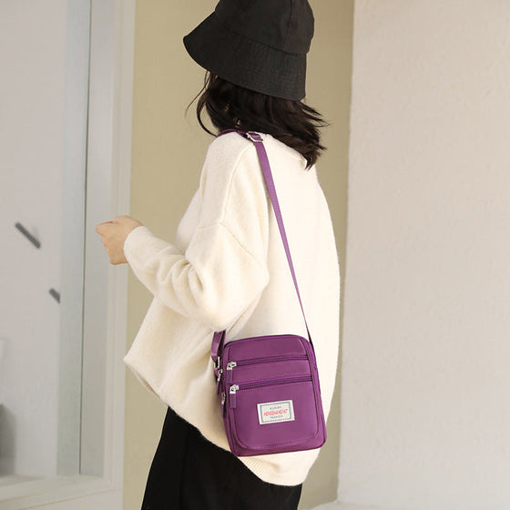 Vattentät lätt axelväska i nylon med stor kapacitet