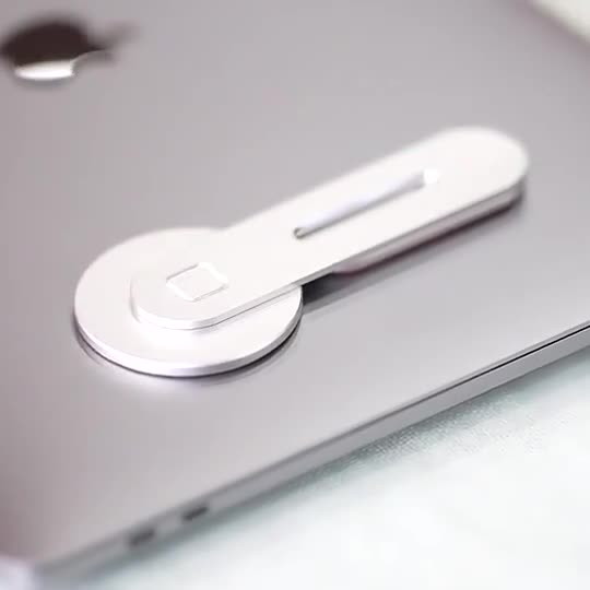 Magnativ telefonhållare för bärbar dator