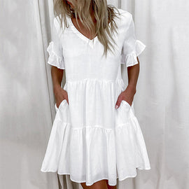 Enfärgad klänning med V-ringad