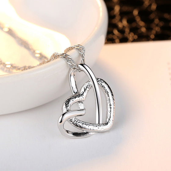 Sammankopplande hjärthalsband