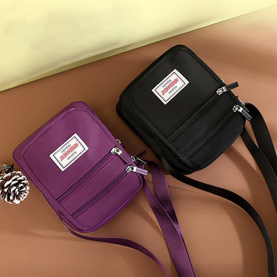 Vattentät lätt axelväska i nylon med stor kapacitet