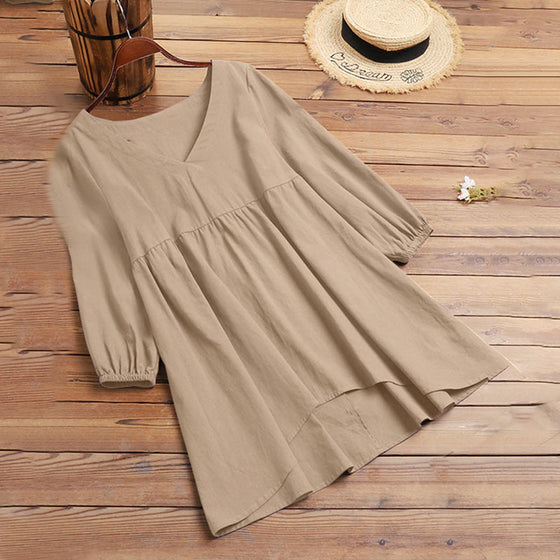 V-ringad blusklänning i bomull