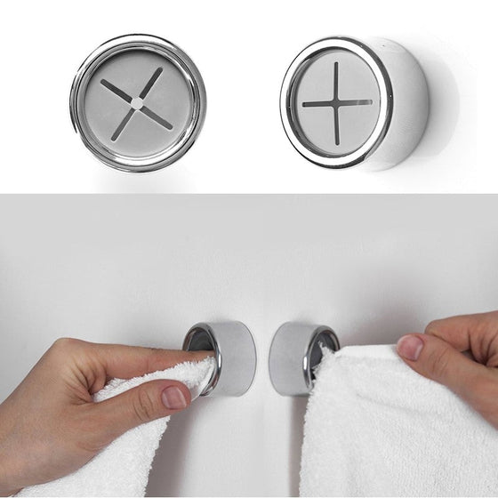 Kreative väggmonterad självhäftande handduksställ utan spik