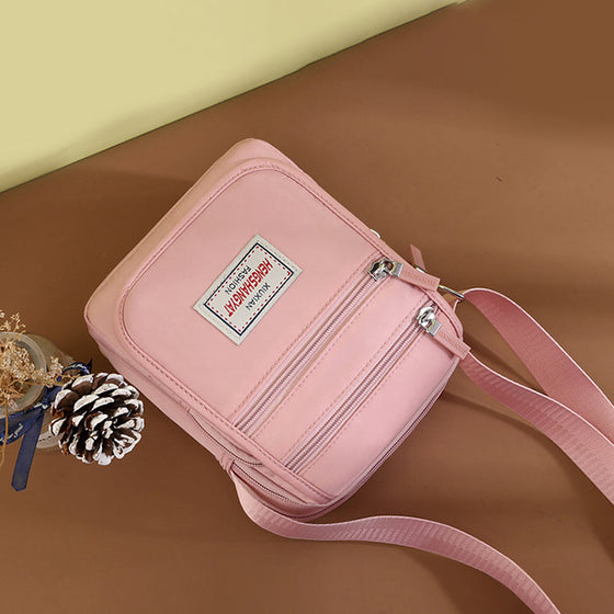 Vattentät lätt axelväska i nylon med stor kapacitet