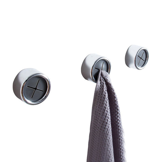 Kreative väggmonterad självhäftande handduksställ utan spik