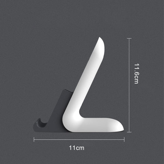 Telefonställ med plats för laddningskabel