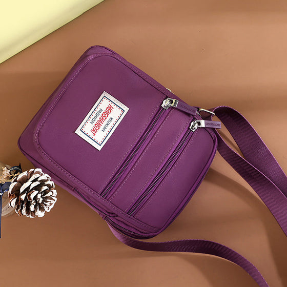 Vattentät lätt axelväska i nylon med stor kapacitet