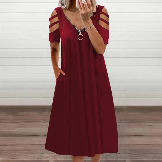 Enfärgad klänning med kort ärm och dragkedja