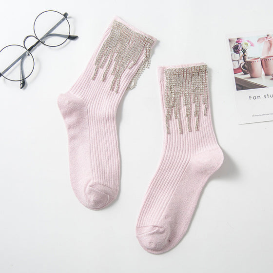 Damstrumpor med tofsar