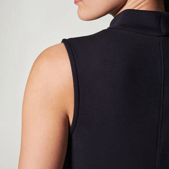 Ärmlös klänning med fickor