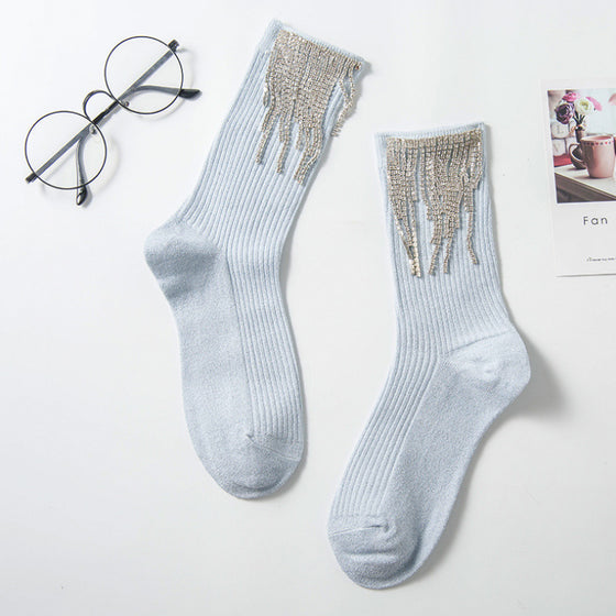 Damstrumpor med tofsar