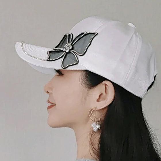 Basebollkeps med fjärilsljus strass