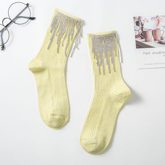 Damstrumpor med tofsar