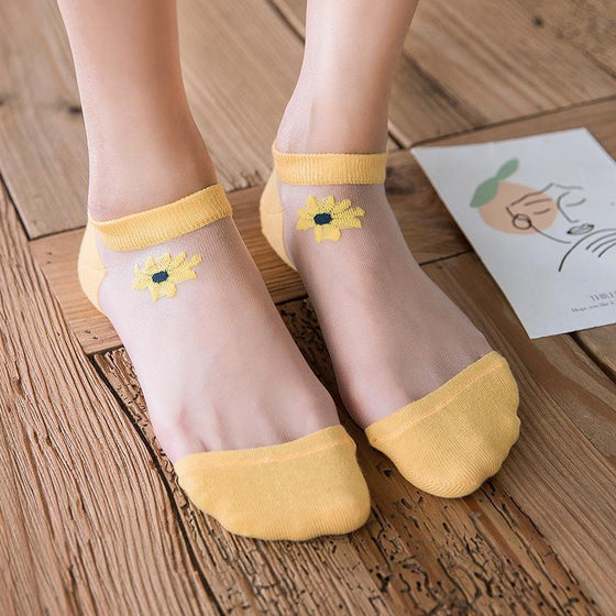 Genomskinliga strumpor |  Blommotiv