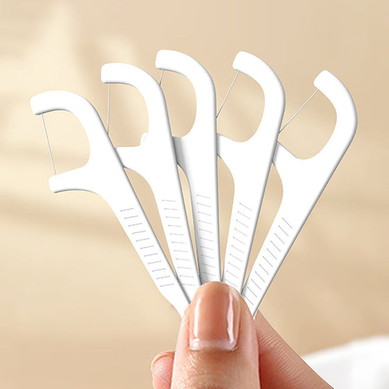 Bärbar tandtrådsdispenser