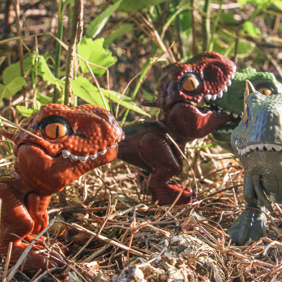 Fingerbitande dinosaurier actionfigurer