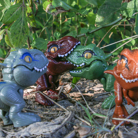 Fingerbitande dinosaurier actionfigurer