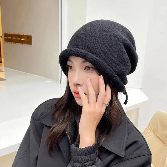 Mössa i popstil med "Show Face" effekt