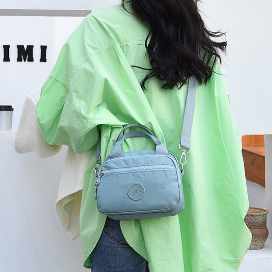 Handväska med flera fack