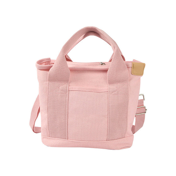 Handväska med flera fickor