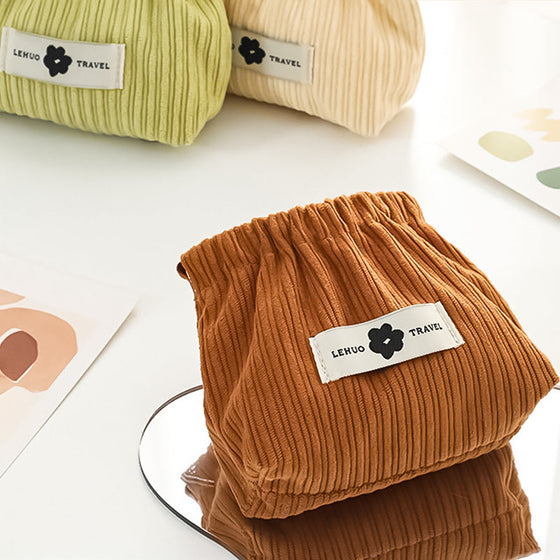 Organisatör för elastiska hårsnoddar i corduroy