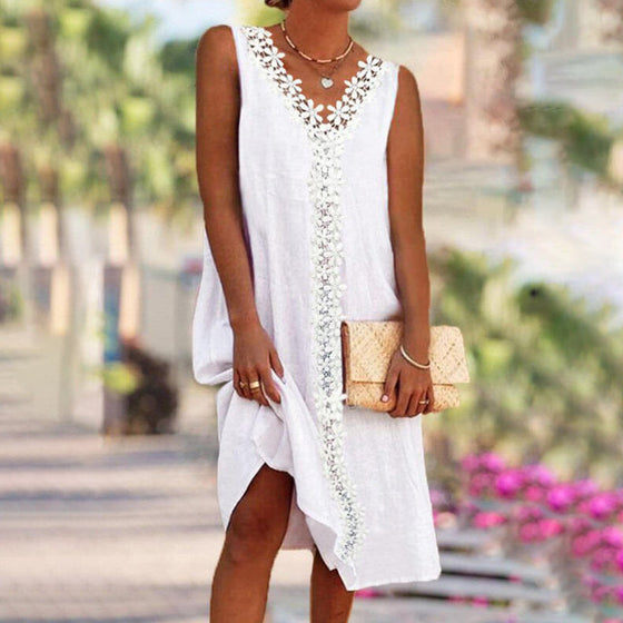 Ärmlös spetsklänning