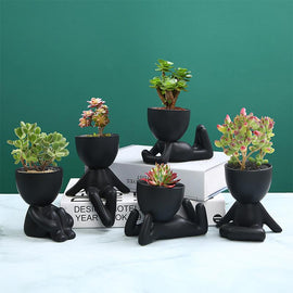 Small people flower pots