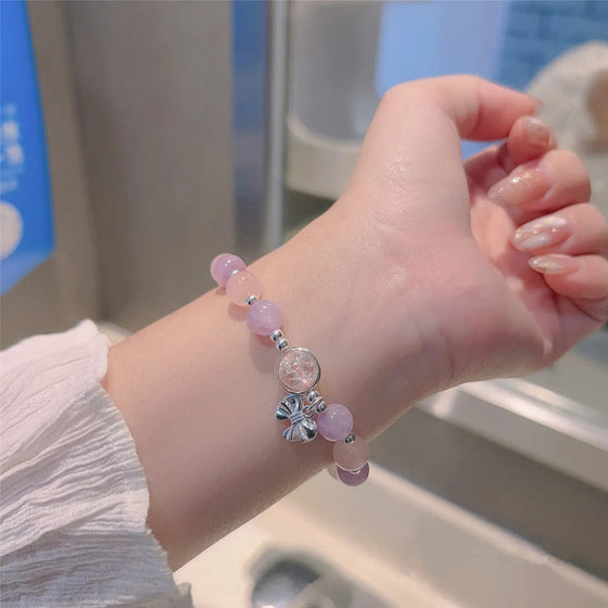 Imiterande kattögonkristallfjärilssmycke