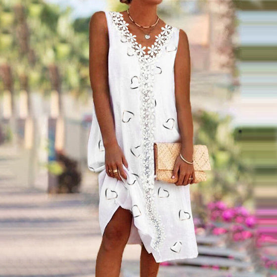 Ärmlös spetsklänning