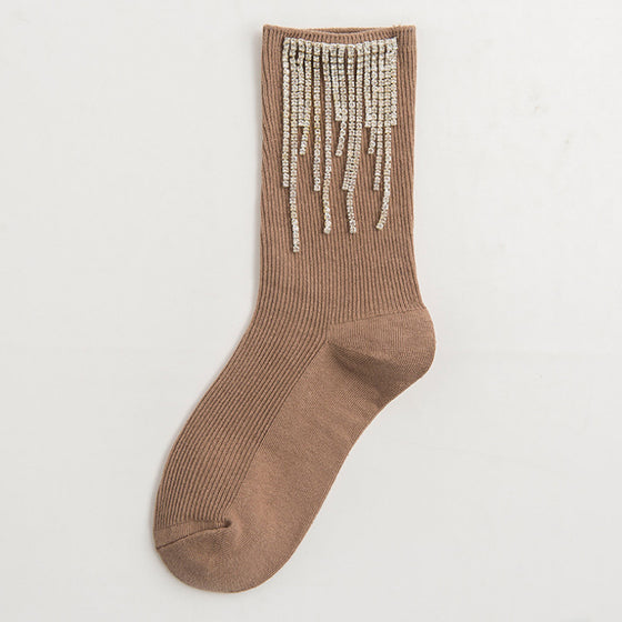 Damstrumpor med tofsar