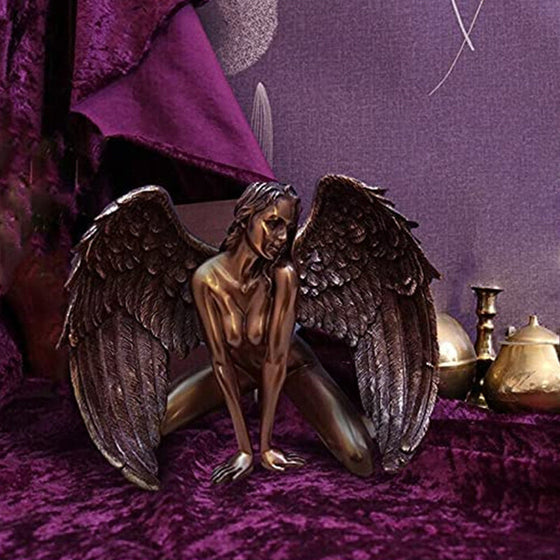 Konstängel kvinnlig med vingar