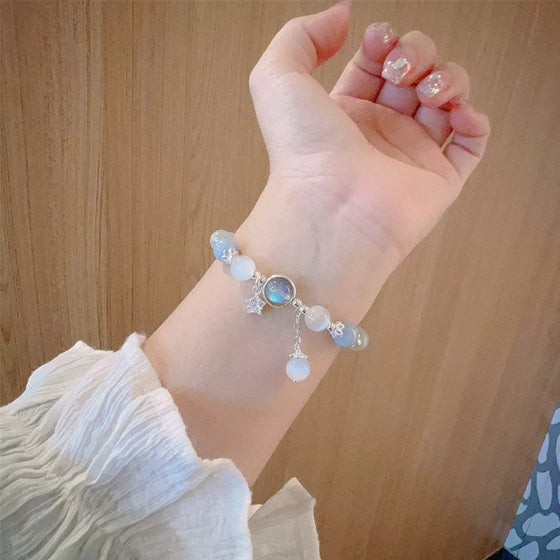 Imiterande kattögonkristallfjärilssmycke