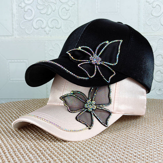 Basebollkeps med fjärilsljus strass