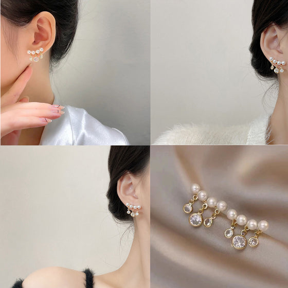 Böjda pärltofs korta örhängen