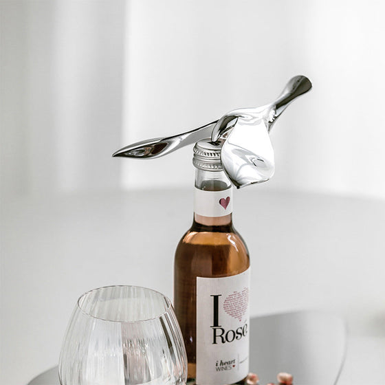 Flasköppnare med flygande fåglar