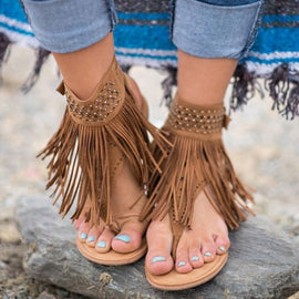 Bohemiska pärlad fiskbenssandaler