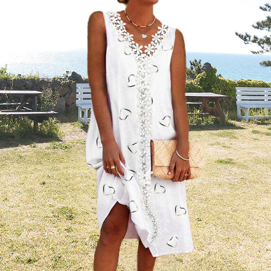 Ärmlös spetsklänning