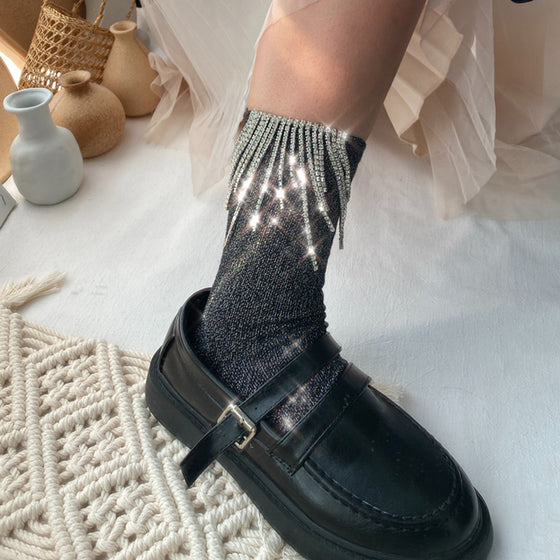 Damstrumpor med tofsar