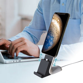 Telefonställ med plats för laddningskabel