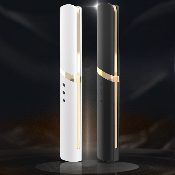 Elektrisk uppvärmd ögonfransböjare