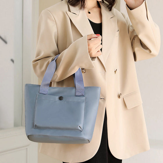 Lätt vattentät nylonaxelväska med stor kapacitet