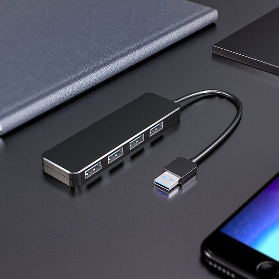 Fyrportars dockningsstation för dator