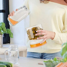 Behållare för saltgurka och oliver med sil