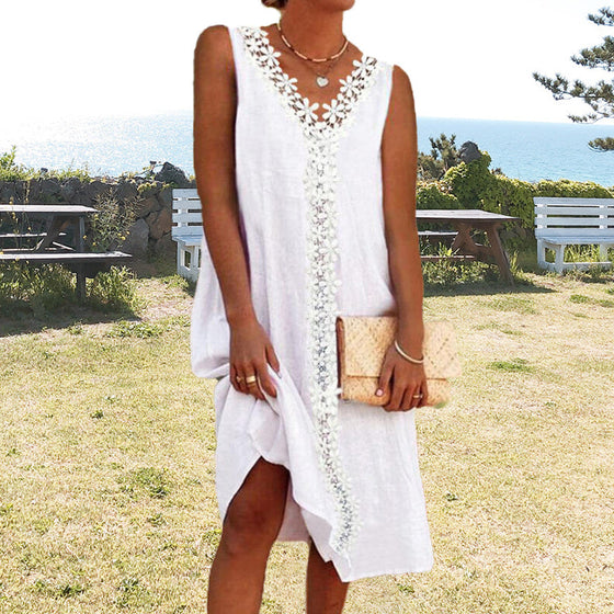 Ärmlös spetsklänning