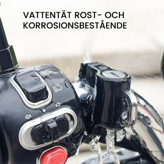 Multifunktionellt säkerhetslås för motorcykelhjälm