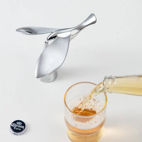 Flasköppnare med flygande fåglar