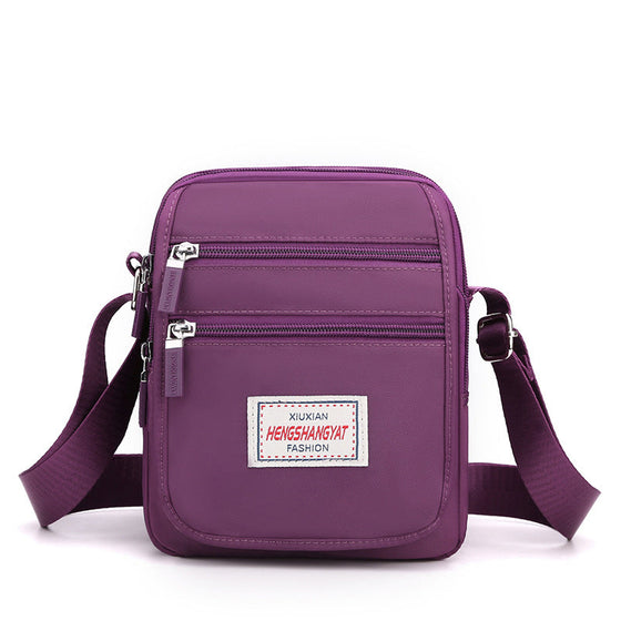 Vattentät lätt axelväska i nylon med stor kapacitet