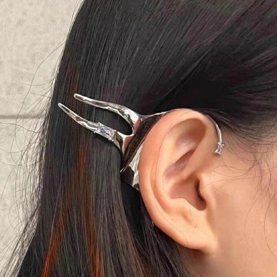 Fe-hår och öronklämmor