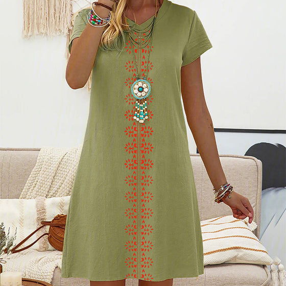 V-ringad kortärmad klänning med tryck