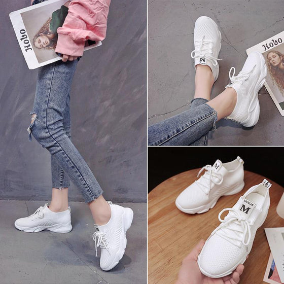 Nya andningsbara stickade sneakers